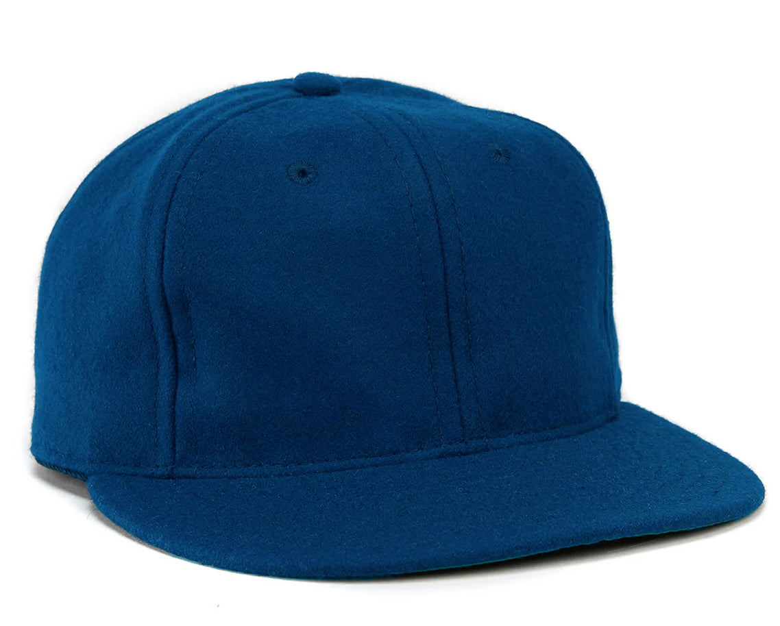 Light navy baseball cap for women with a curved brim.